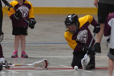 Travis playing lacrosse